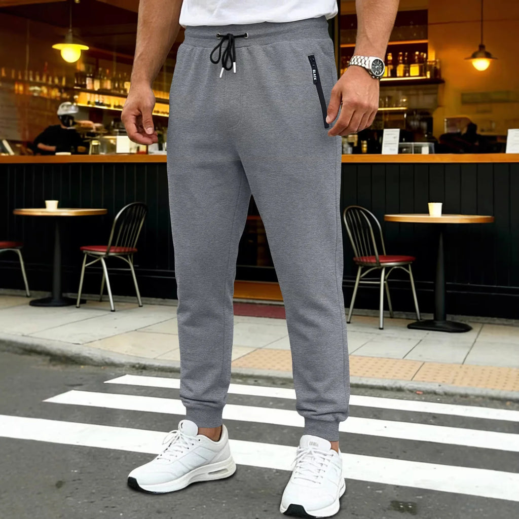 Spring/Autumn High-Quality Men's Sport Pants with Drawstring Cuffs and Zippered Pockets - Solid Color Elasticated Casual Pants