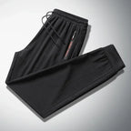 Men's Summer Ice Silk Jogger Sweatpants Zipper Pockets Breathable Running Gym Workout Athletic Mesh Pants Drawstring Design