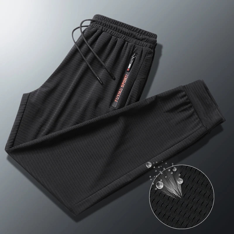 Men's Summer Ice Silk Jogger Sweatpants Zipper Pockets Breathable Running Gym Workout Athletic Mesh Pants Drawstring Design