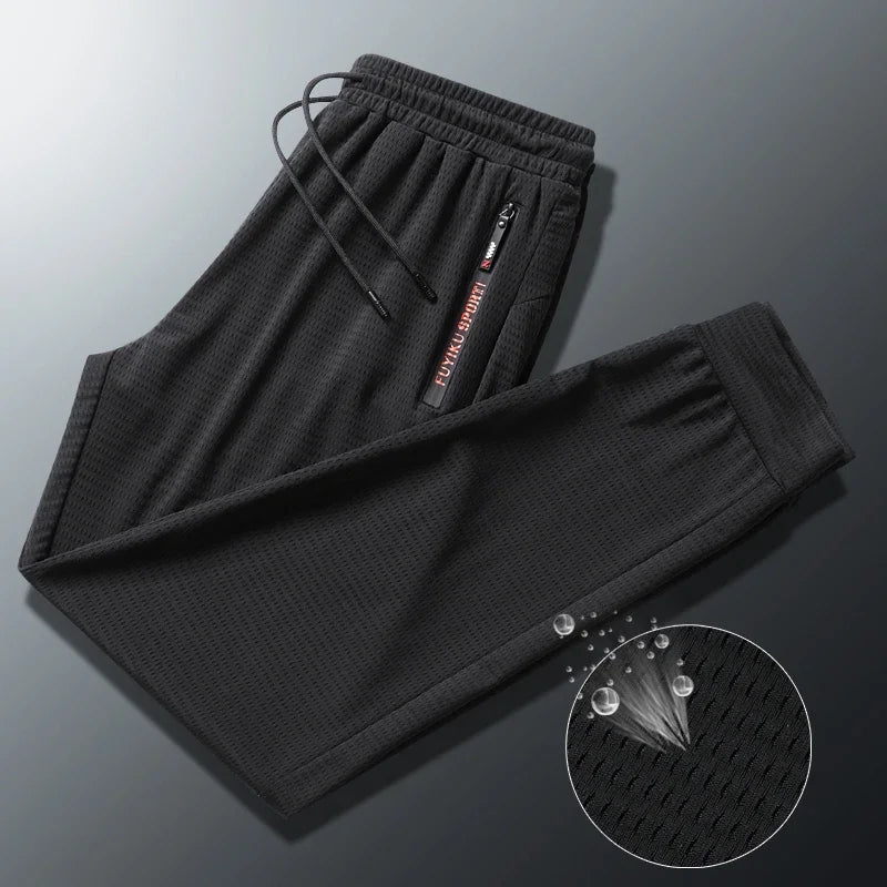 Men's Summer Ice Silk Jogger Sweatpants Zipper Pockets Breathable Running Gym Workout Athletic Mesh Pants Drawstring Design