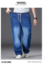 8XL Elastic Waist Men's Jeans, Loose Straight Leg Stretch Denim Pants, Plus Size Casual Streetwear, Big Size Relaxed Fit Trouser