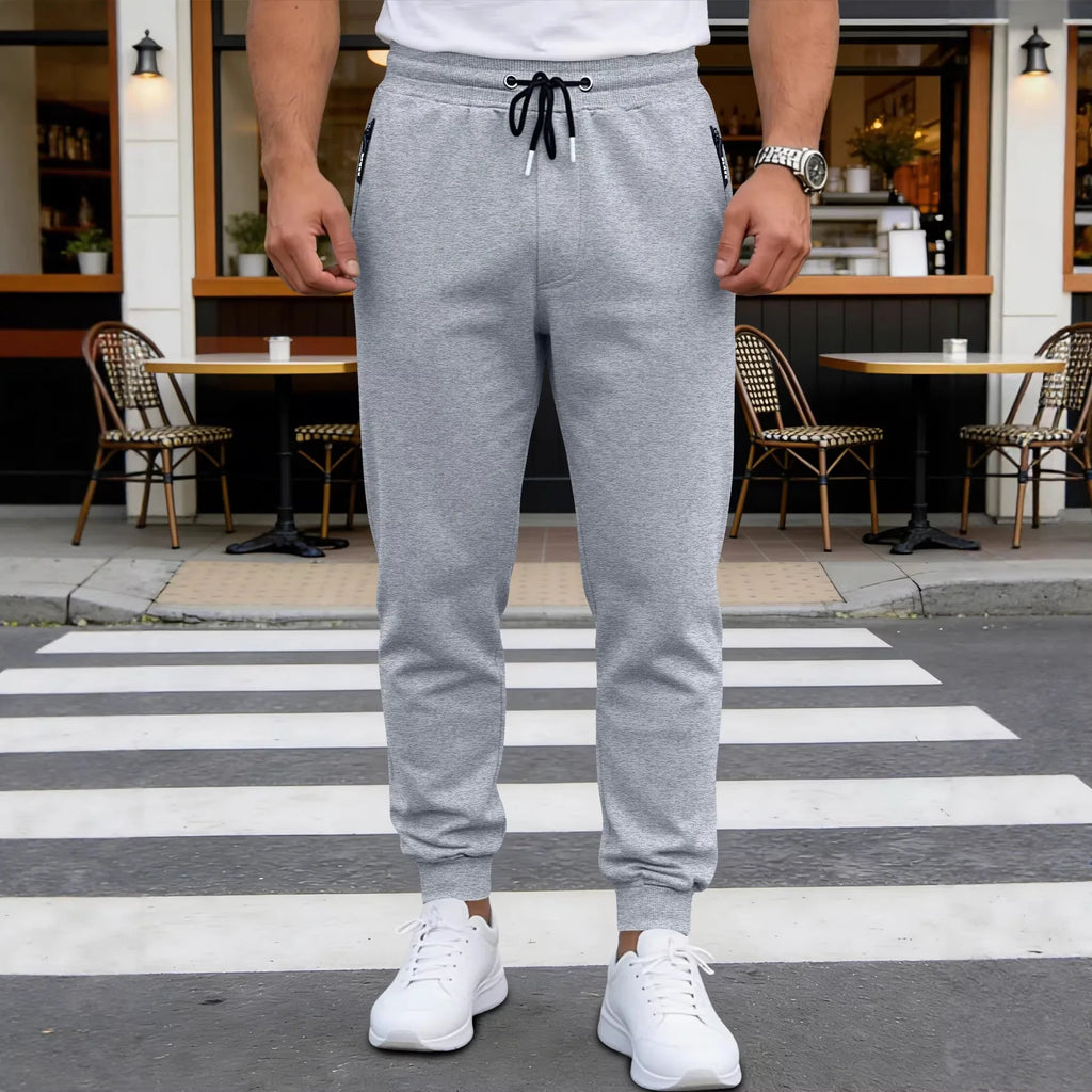 Spring/Autumn High-Quality Men's Sport Pants with Drawstring Cuffs and Zippered Pockets - Solid Color Elasticated Casual Pants