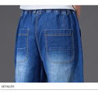 8XL Elastic Waist Men's Jeans, Loose Straight Leg Stretch Denim Pants, Plus Size Casual Streetwear, Big Size Relaxed Fit Trouser