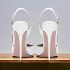 New silver patent leather flat buckle sandals with pointed edges and slim heels, stylish and stylish, worn in the backless style