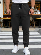 Spring/Autumn High-Quality Men's Sport Pants with Drawstring Cuffs and Zippered Pockets - Solid Color Elasticated Casual Pants