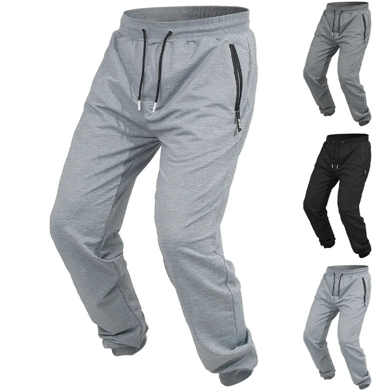 Spring/Autumn High-Quality Men's Sport Pants with Drawstring Cuffs and Zippered Pockets - Solid Color Elasticated Casual Pants