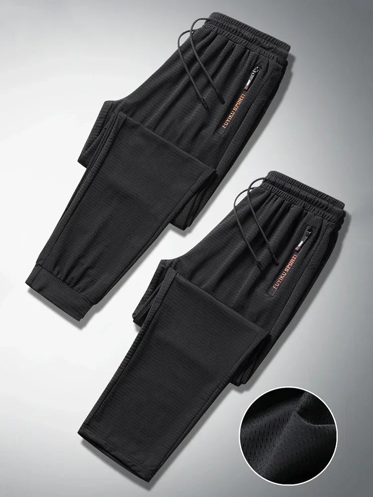 Men's Summer Ice Silk Jogger Sweatpants Zipper Pockets Breathable Running Gym Workout Athletic Mesh Pants Drawstring Design